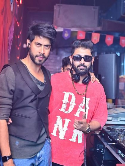 Posing with a friend and fellow artist at Tipsy Bull.