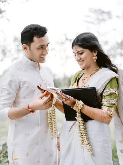 He gave her a custom photobook of their story, and this is her reaction. A beautiful, candid moment of them sharing a memory and creating a new one.
