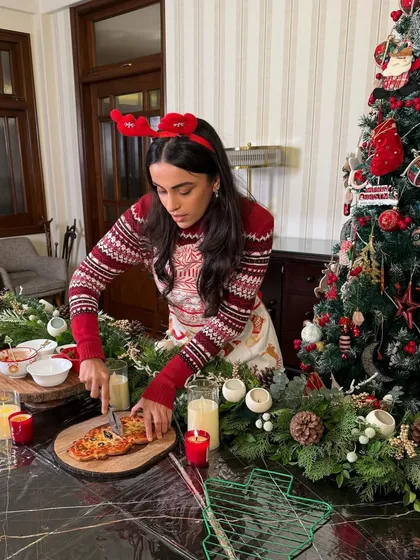 It's not just for kids. Here, I'm getting into the festive spirit by preparing a tree-shaped pizza from one of my Christmas DIY kits.
