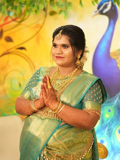 Saree draping is for every special milestone. Here is a radiant mom-to-be at her Valaikaappu (baby shower). I ensure a comfortable and secure drape that beautifully accommodates the baby bump while maintaining a traditional and graceful look.
