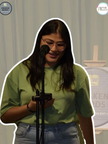 A young poet sharing her verses at the "Awaken Words" open mic. We welcome performers of all ages.