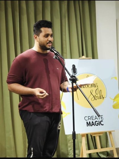 A performer gestures to the audience, creating an engaging atmosphere.