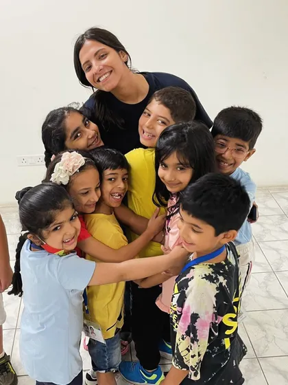 The love is mutual. This group hug shows the strong bond between our teachers and students.