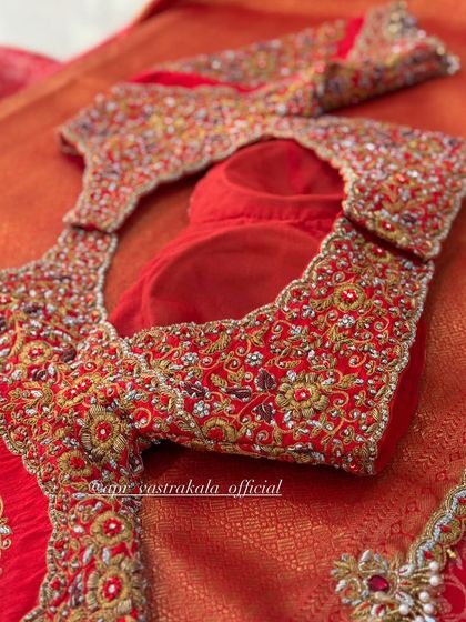 The back of the red blouse, showing the sheer panel.