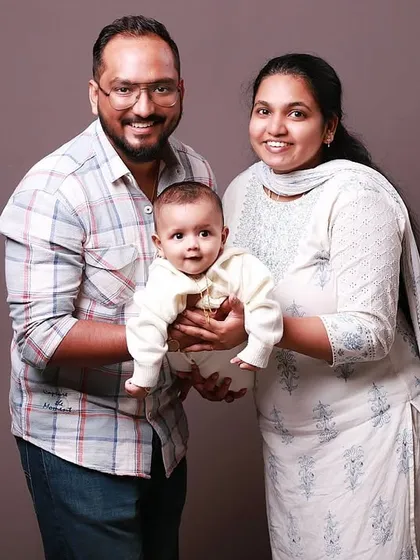 The first family portrait is always a treasure. In my studio, I focus on capturing the simple, powerful connection between new parents and their baby, creating a timeless memory of when your family began.