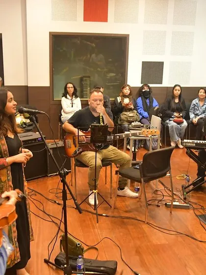 Another angle from our open rehearsal. It was a unique opportunity for us to connect with the local music community and share the stories behind our songs.