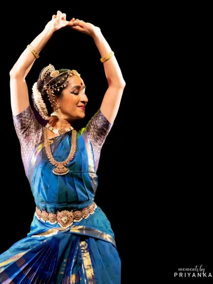 A moment of serene grace. The arms form a beautiful frame around the face, drawing attention to the expressive potential of the upper body.