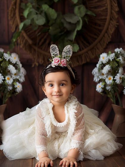 On the move! This crawling shot captures the determination and curiosity of a baby exploring the studio during her milestone session.