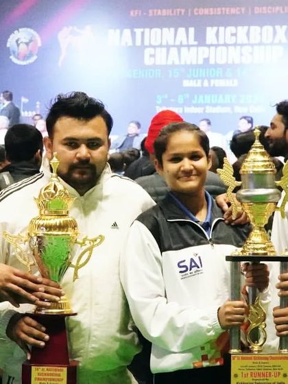 This is what I call a nationals takeover. The Fighting Choice team at Rank 1, holding up our trophies at the National Kickboxing Championship. Congratulations to all the athletes and coaches.