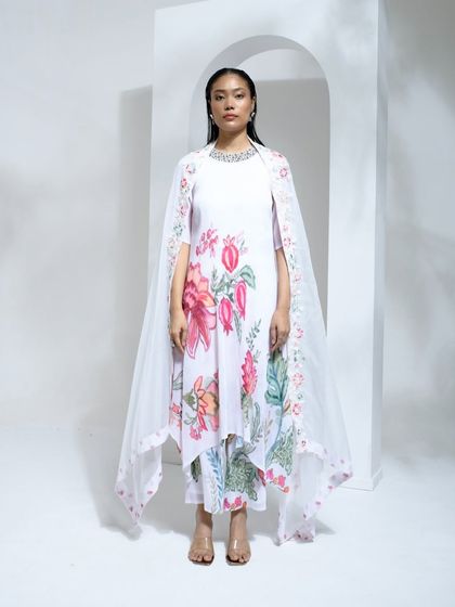 This extensive collection features a wide array of modern festive attire. From vibrant sharara sets and elegant anarkalis to chic jumpsuits and light lehengas, these pieces are curated for wedding guests and anyone looking for a stylish outfit for a special occasion.