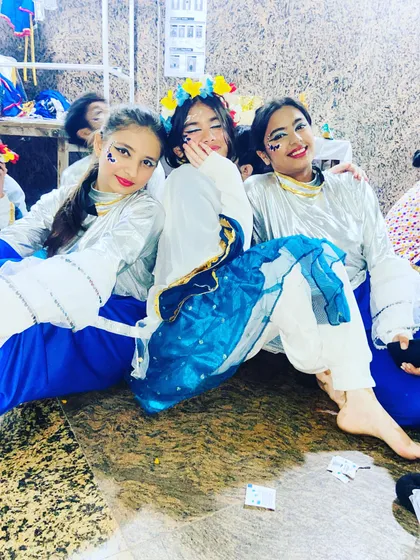 A candid moment backstage with some of the student performers relaxing before their turn on stage. It's important to create a fun, low pressure environment.