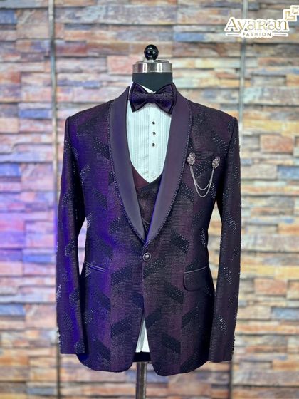 Our wine-colored patterned suit, shown here from the front. This five-piece ensemble is a fantastic rental option for wedding receptions, offering a rich color and modern design that stands out.