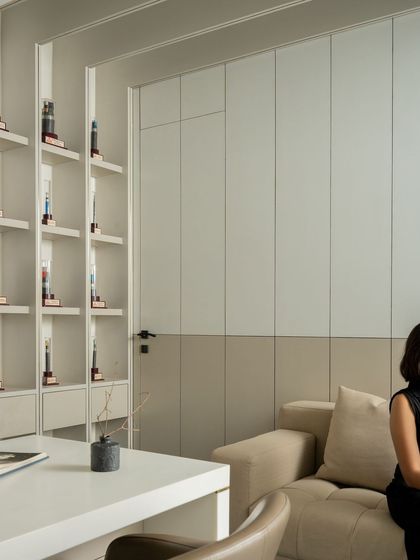 A wider view of the MD's cabin, showing the comfortable visitor's sofa and the overall serene and professional atmosphere of the space.