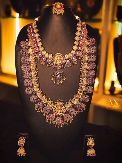 A professionally shot photo of one of my grandest temple jewellery sets. This set features a kasu mala with ruby-colored stones.