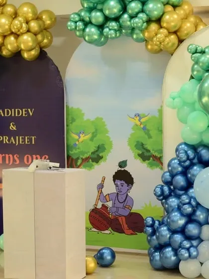 A close-up of the Little Krishna decor, highlighting the character illustration and the toy car prop.