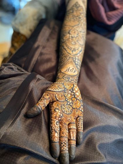 A single arm view, showing the name integrated into the design.