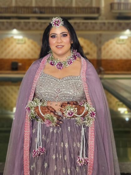 The full look, with her beautiful ombre lehenga and custom floral jewellery. She looks like a dream.