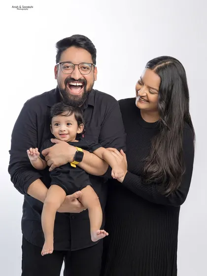 A beautiful family portrait filled with laughter and love. We aim to make our studio sessions comfortable and fun, so your family's true personality shines through.