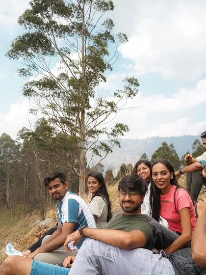 Chilling with the crew on a hilltop in Kodaikanal. The gentle breeze, the vast hills, and the company of new friends make for a perfect weekend escape from the city.