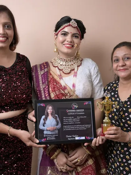 Celebrating a student's graduation. She is now a certified makeup and hairstyle artist, ready for the industry.