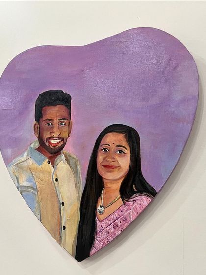 The completed heart-shaped canvas portrait for a wonderful and ambitious couple. It was an honor to create this piece for them as a thank you for their constant support.