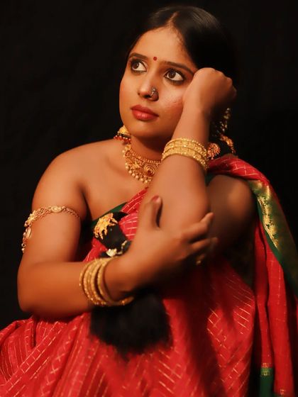 A thoughtful pose from the vintage shoot, showcasing the traditional makeup and hairstyle.