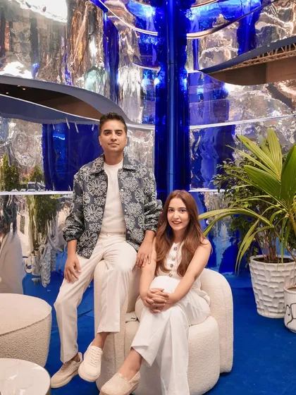 We are the dreamer and the go-getter. This is us, the co-founders of Design Doodle, inside our 'Mercury' creation. We thrive on combining wild imagination with hands-on execution to build temporary worlds that leave a permanent impression.