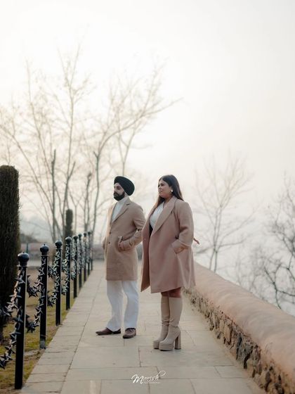 A classic portrait on a stone walkway in Kashmir, the misty background adding to the moody and romantic atmosphere.