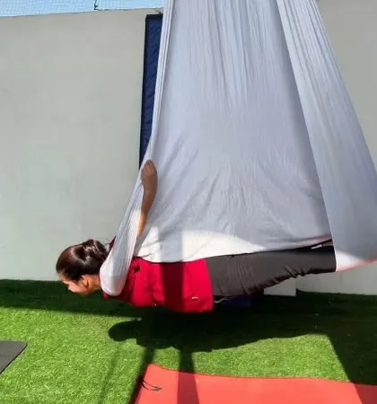 Another shot of our student in a restorative pose. This is perfect for the end of a session.
