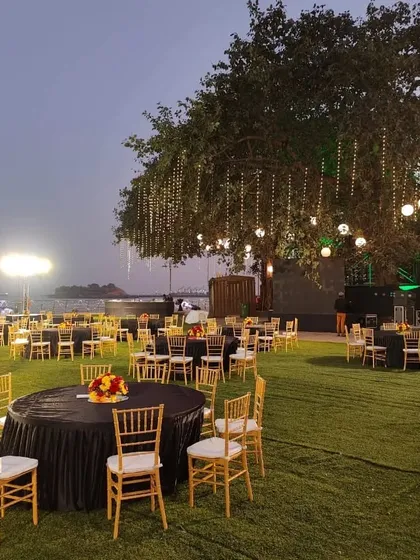 An evening view of a large-scale outdoor event we catered. We handle everything from the menu to the setup, ensuring a seamless experience for hundreds of guests, as seen here at the Belgian King's Day celebration.