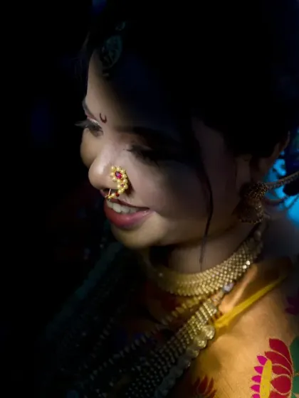 Another artistic bridal portrait using creative blue lighting and shadow to create a moody and captivating image.