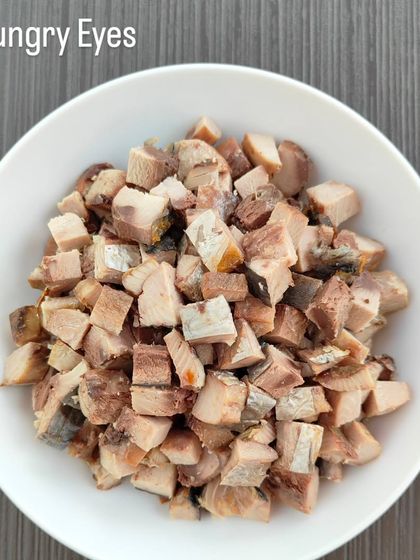 A bowl of our fresh baked fish, ready to be served. This simple topper adds immense nutritional value and flavor to any meal.