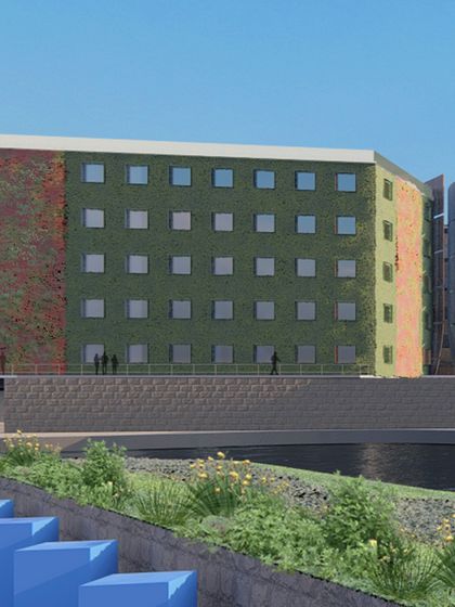 A rendering of a commercial building with a green facade. Our team invested significant effort in shaping this architectural piece, blending creativity and functionality to make the space come alive.