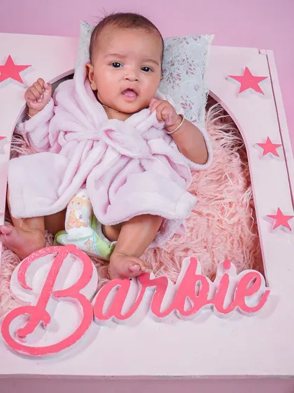 A life-sized Barbie box prop for a fun and trendy photoshoot. This baby is rocking the Barbie look!