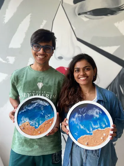 Here is a happy couple after finishing their very own resin beach art pieces. Our workshops are a perfect idea for a creative date night where you can relax, laugh, and take home a beautiful memory you made together.
