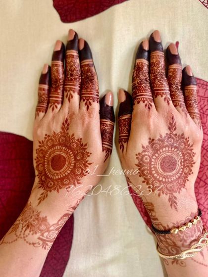A beautiful, dark stain on a classic mandala design. This is the result of my 100% organic henna.