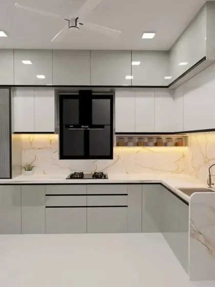 Here is the kitchen in a sophisticated grey and white. All our modular kitchen designs come with a 10-year warranty and are delivered in as fast as 45 days.