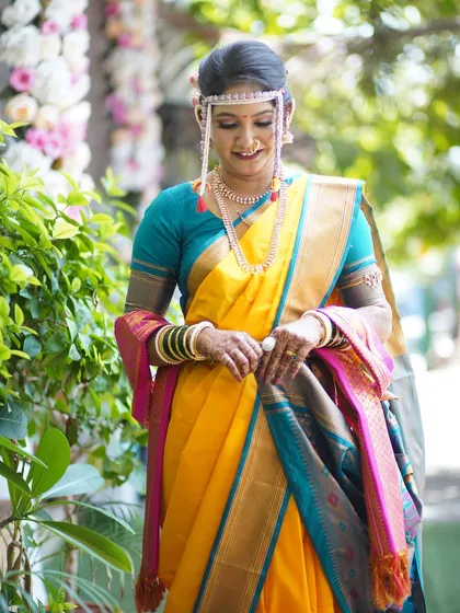 A candid, happy moment of the bride. The makeup is designed to look fresh and vibrant, capturing her joyful spirit.