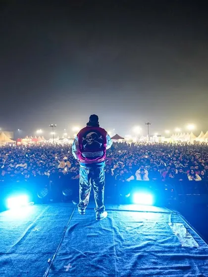 Facing a sea of fans, this is the view from my office. I command the energy of the biggest crowds, making sure every single person feels the beat.