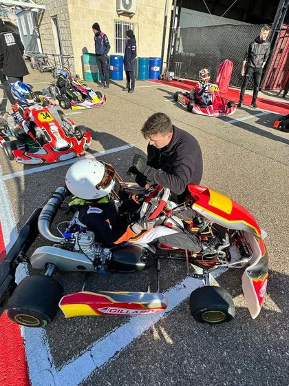 A driver and coach in the pit lane in Zuera, Spain.