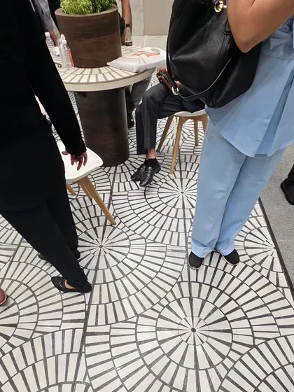 Another example of our circular-patterned designer tiles used in a high-traffic commercial space, demonstrating their style and durability.