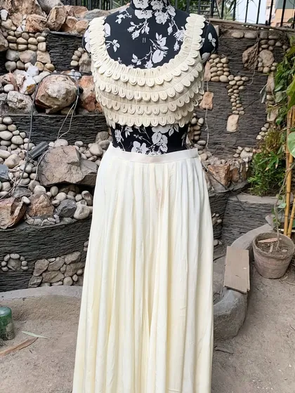 The flowy pants and scalloped blouse without the jacket. A beautiful co-ord set on its own.