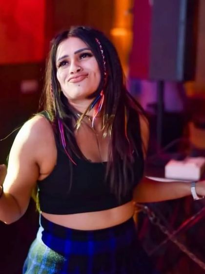 The energy on the dance floor is contagious. Here's a partygoer feeling the beat.