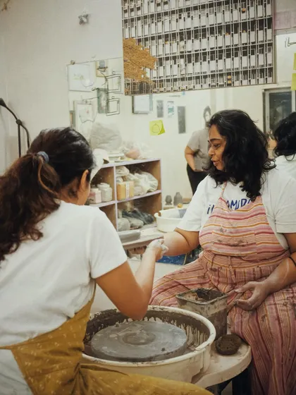 This is where the learning happens. I guide each student, helping them feel the movement of the clay on the wheel. It’s a partnership, and my goal is to help you find your own rhythm and confidence.