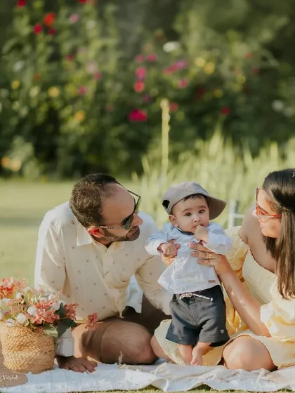 A beautiful family enjoying a day in the park. The natural setting provides a stunning backdrop for their portraits.
