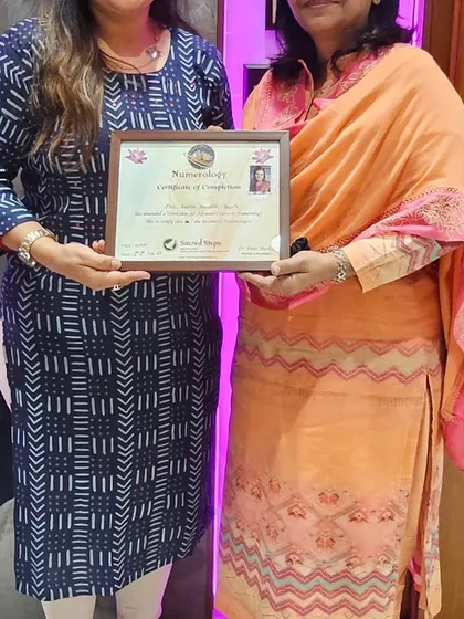 My wife Tasneem awarding a certificate to a participant. We are proud to empower others with this ancient knowledge.