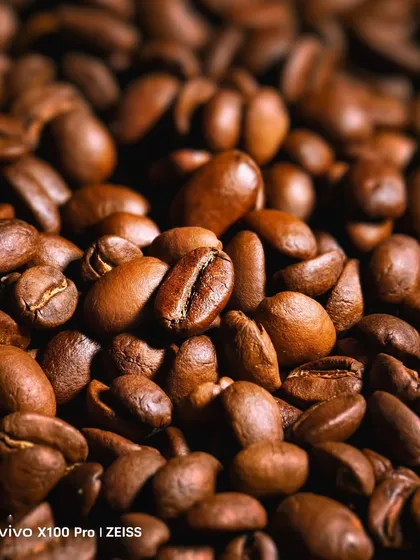 A close-up, textured shot of roasted coffee beans, taken for the vivo campaign. This demonstrates my skill in macro photography and capturing fine details.