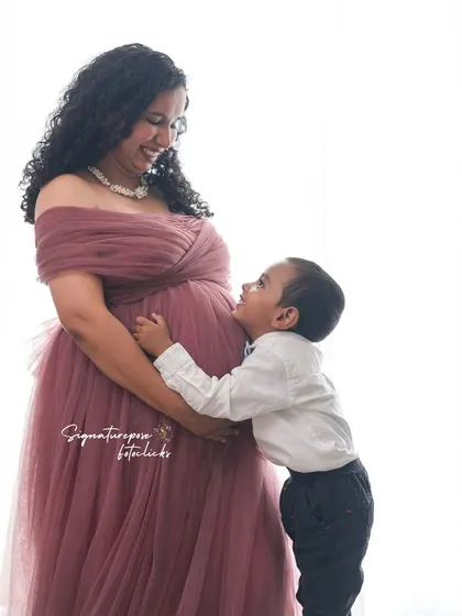 Welcoming a new baby is a family affair. I love capturing these sweet moments when an older sibling connects with the baby bump, full of excitement and love. It’s about telling the story of your growing family.