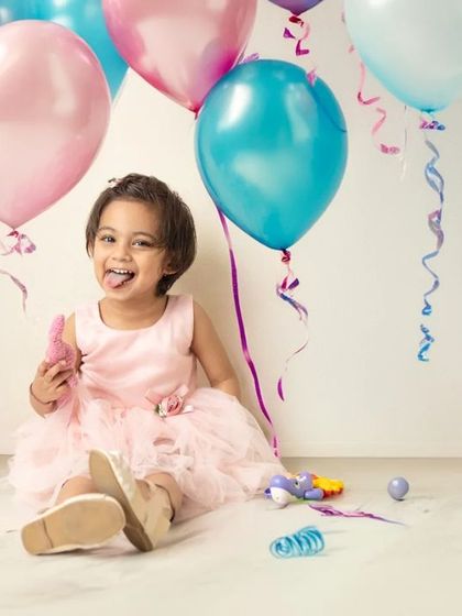 Simple, classic, and full of joy. A session with colorful balloons is a timeless way to capture the playful spirit of a birthday celebration.