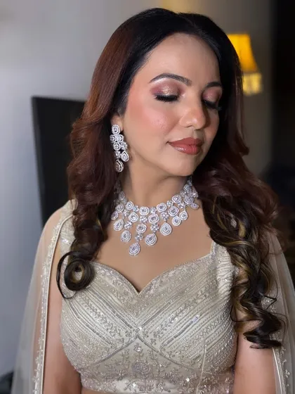 A close-up on the eye makeup for this engagement look, showing a blend of soft pinks and shimmers for a romantic feel.